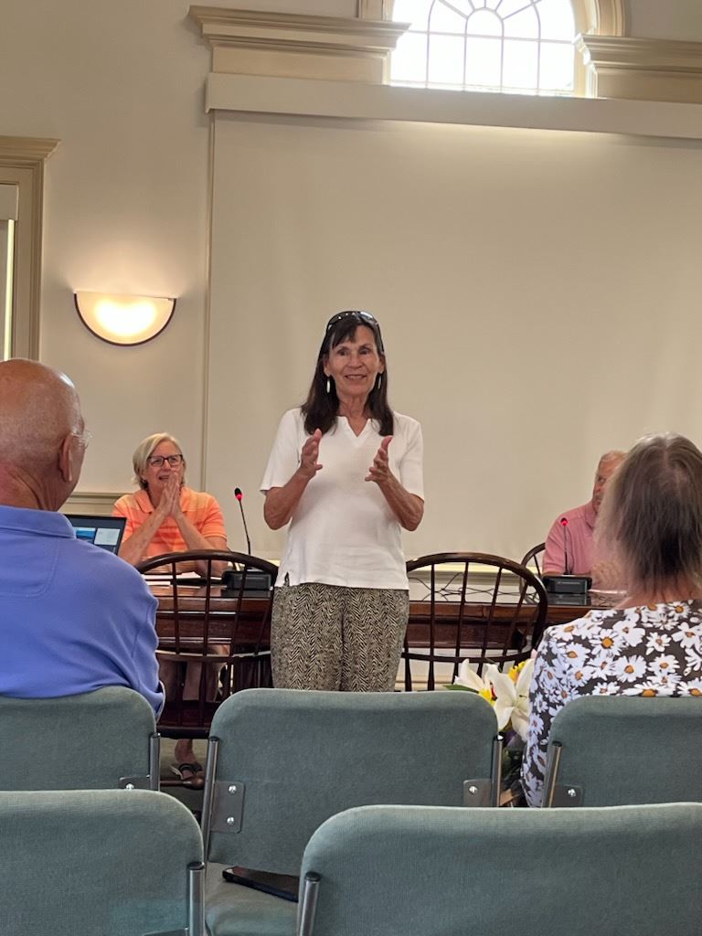 Nancy Hutchinson recognizing Kim Barrows